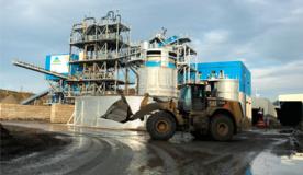 Treatment plant for sludge from contaminated soil